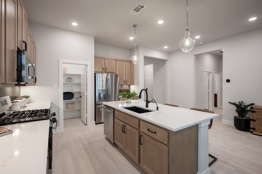 Representative furnished interior of a home built from the Falcon by Tri Pointe Homes in Pecan Ridge, Fulshear (Image 60).