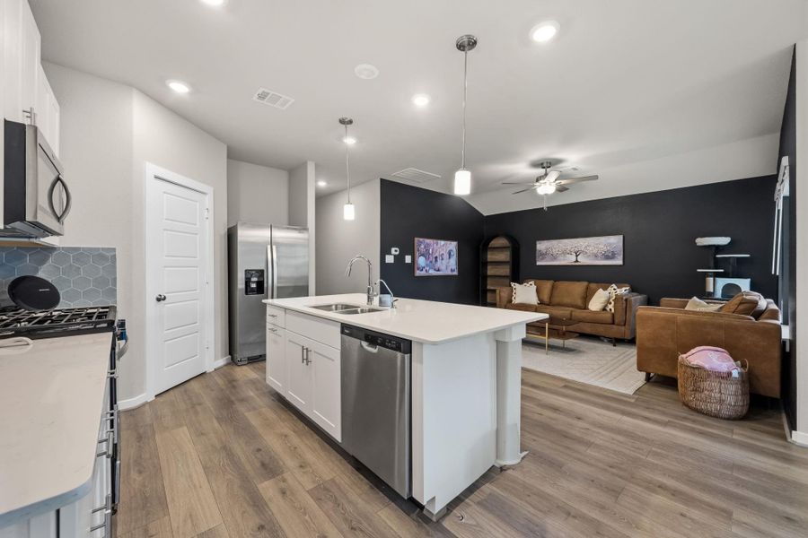 Furnished interior view inside a new home in Heights of Barbers Hill, Mont Belvieu (Image 9).