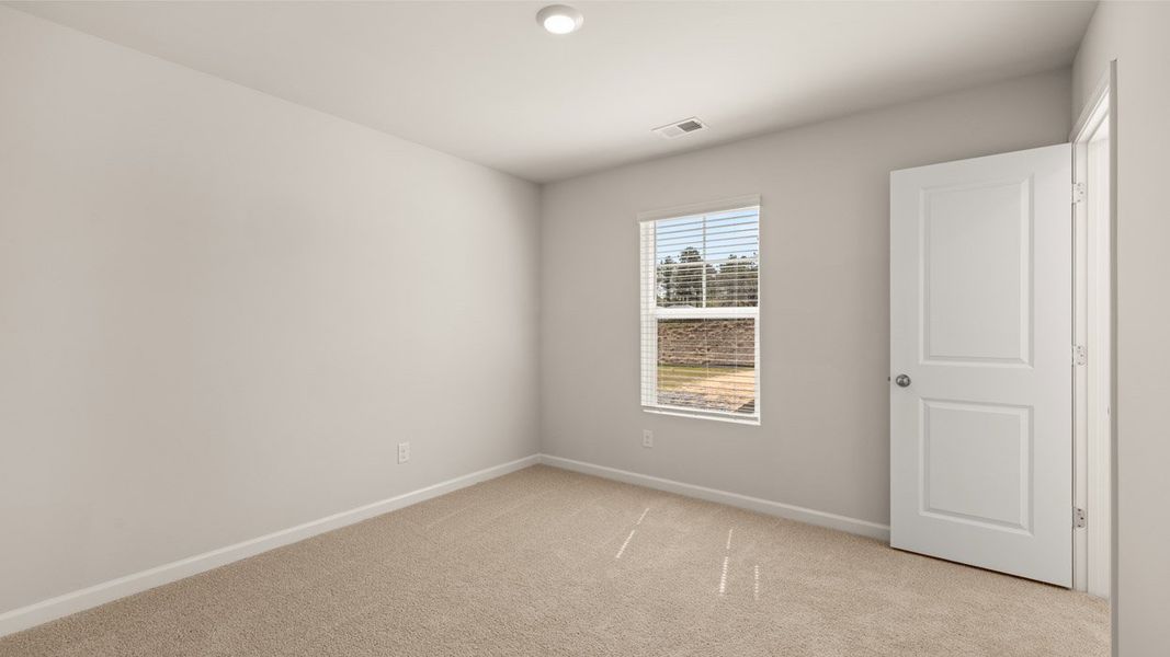 Spacious, unfurnished interior of a new home in Byrd Village, Graniteville (Image 24).