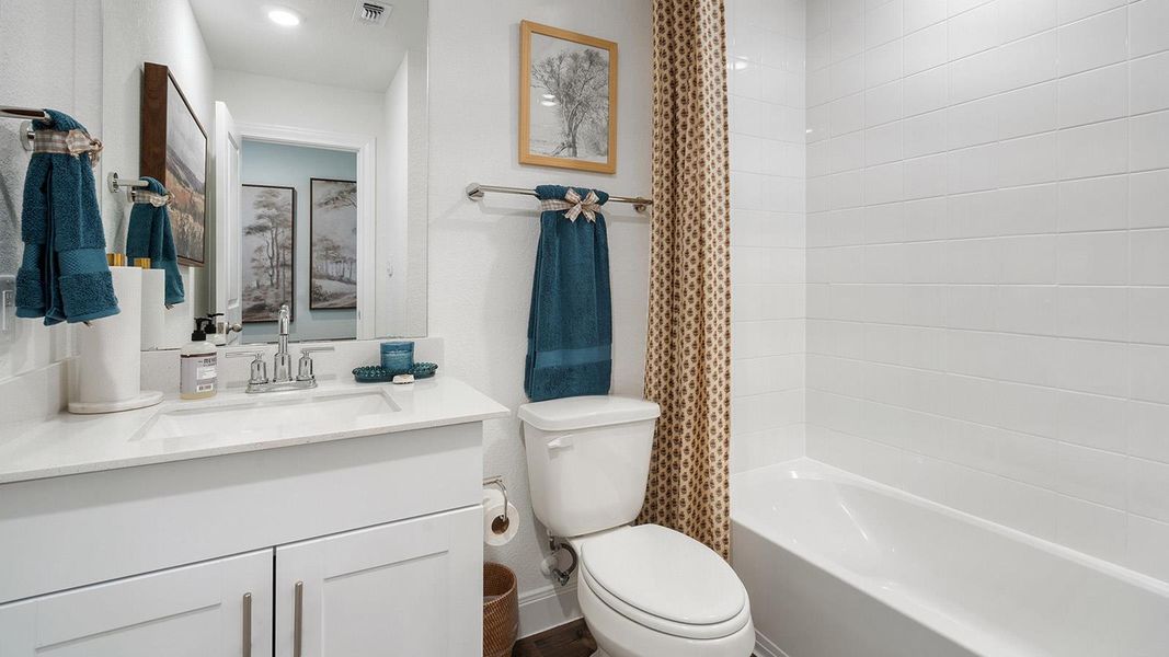 Furnished interior view inside a new home in Railhead, Cedar Creek (Image 29).