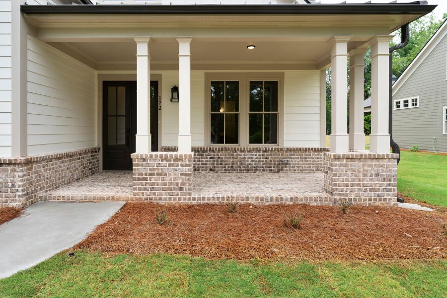 Exterior details and patio area of a home in Lake Arrowhead, Waleska (Image 3).