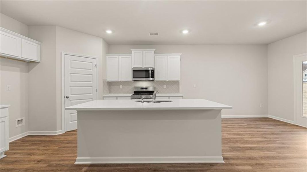 Furnished interior view inside a new home in The Preserve at Agricultural Village, Perry (Image 9).