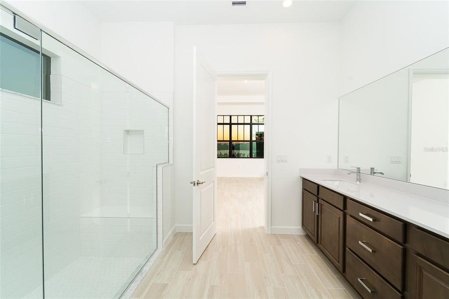 Furnished interior view inside a new home in Tesoro Club, Port St. Lucie (Image 10).