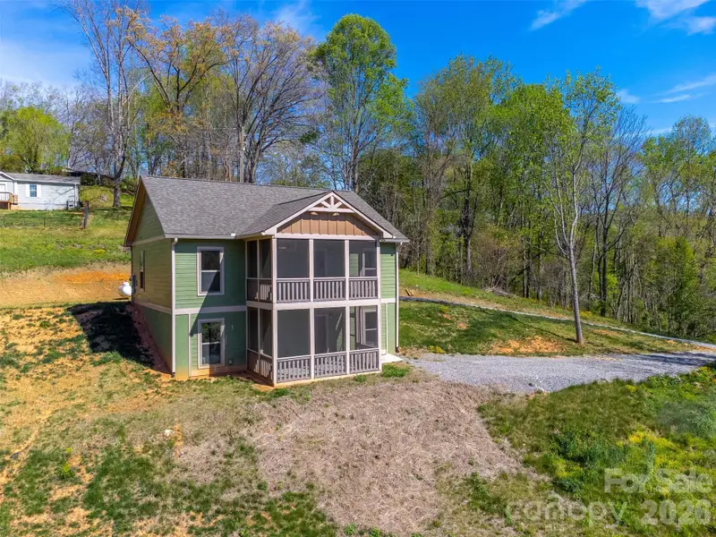 Exterior details and patio area of a home in , Waynesville (Image 3).