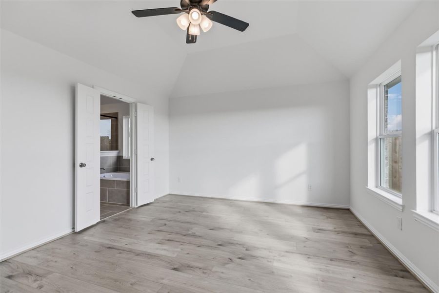 Spacious, unfurnished interior of a new home in Creekhaven, Iowa Colony (Image 19).
