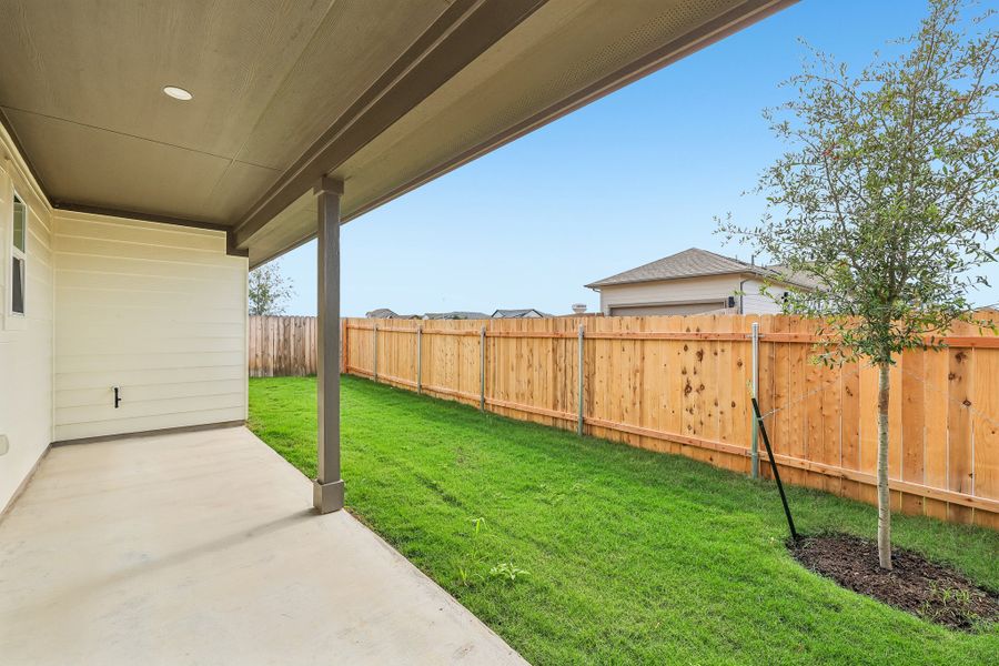 Exterior details and patio area of a home in Porter Country, Buda (Image 2).