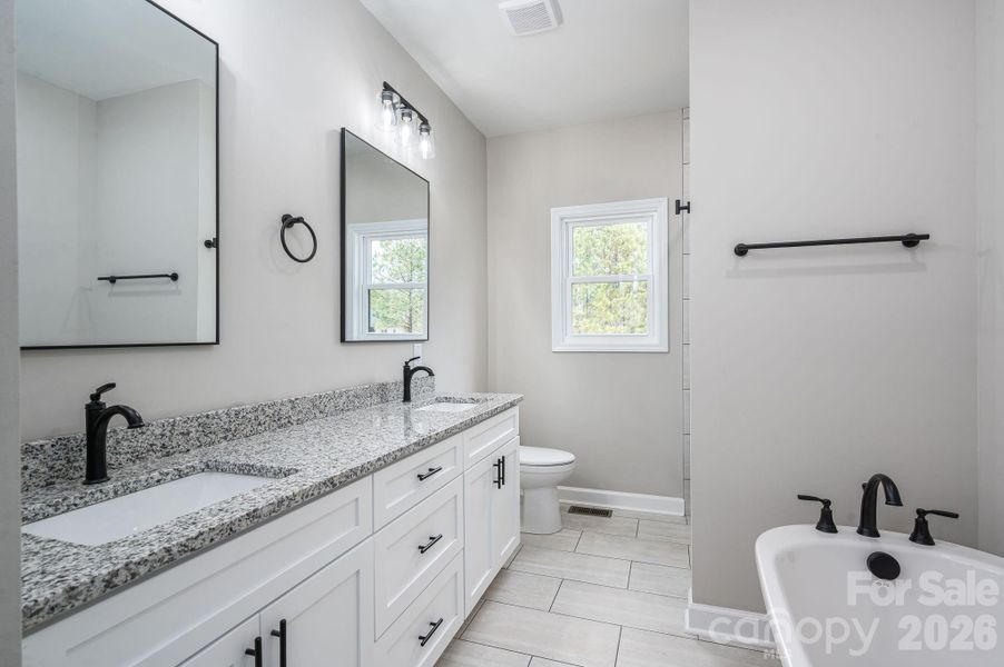 Furnished interior view inside a new home in , Vale (Image 5).