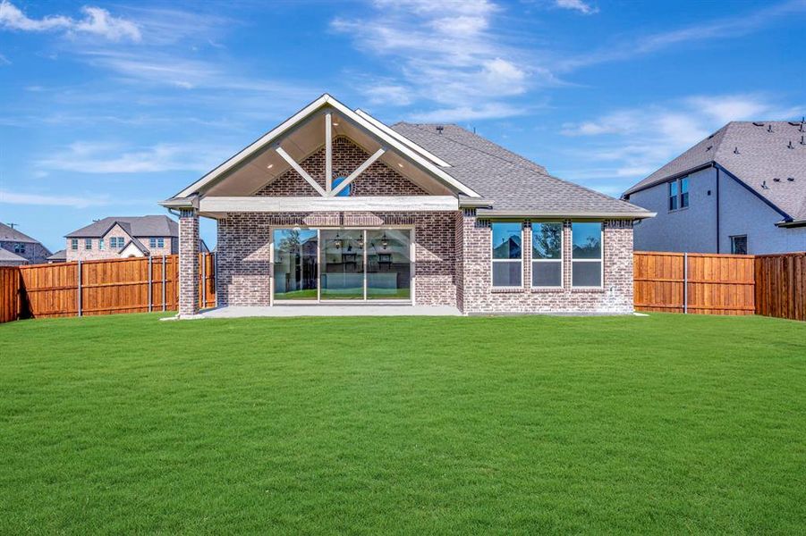 Exterior details and patio area of a home in Kreymer at the Park, Wylie (Image 23). Exterior details and patio area of a home in Kreymer at the Park, Wylie (Image 23).