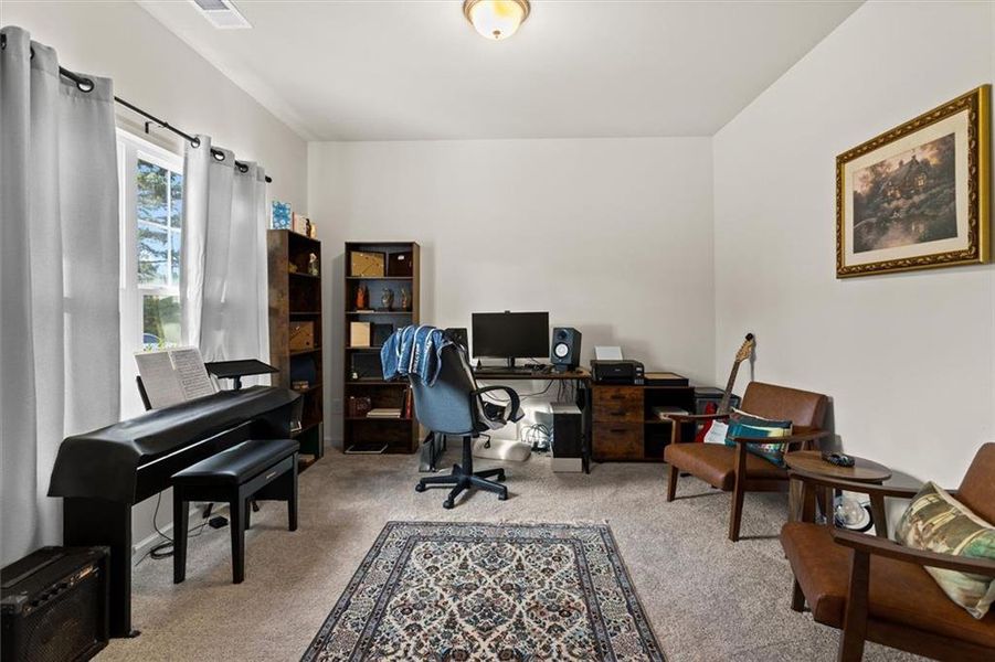 Furnished interior view inside a new home in Garrett Preserve, Hiram (Image 11).