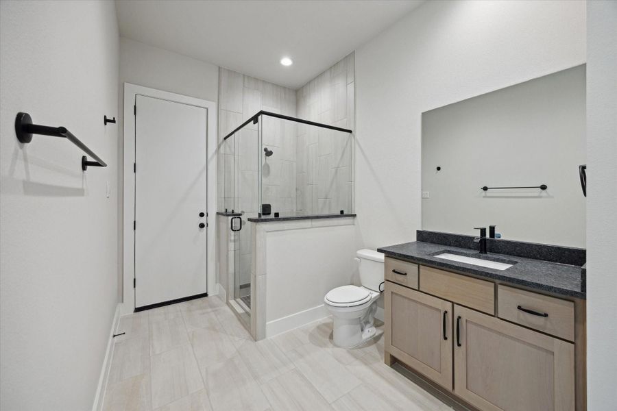 Full Bath of off the Game Room/Flex Space (with direct access to Backyard - perfect Pool Bath!)