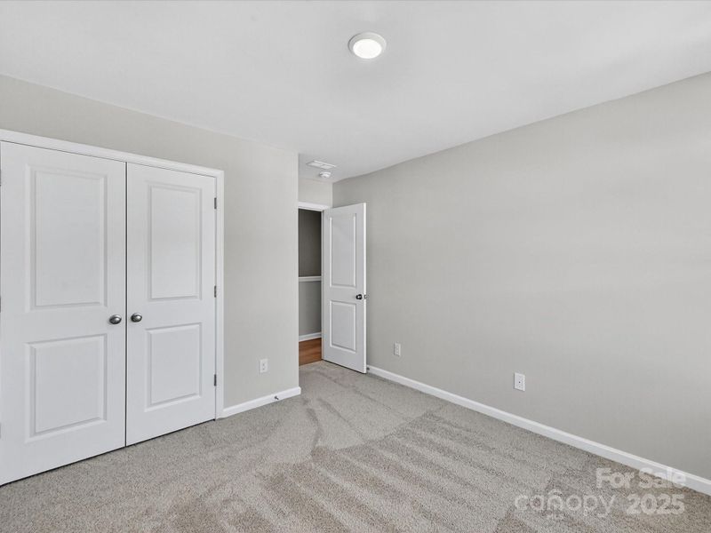 Spacious, unfurnished interior of a new home in North Creek Village - Townhomes, Huntersville (Image 38).