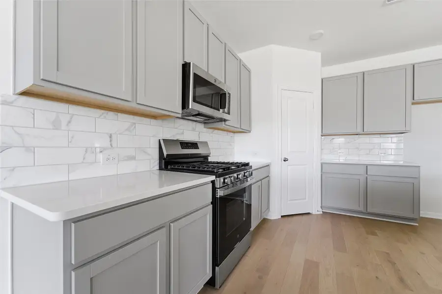 Furnished interior view inside a new home in Pebblebrook, Sherman (Image 7).