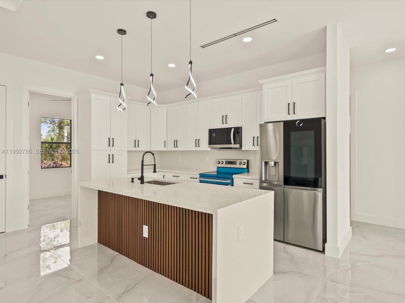 Furnished interior view inside a new home in , Lehigh Acres (Image 5).