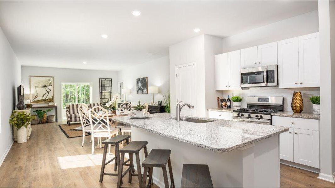 Furnished interior view inside a new home in Lindera Preserve at Cane Bay Plantation: American Dream Series - Ph 15, Summerville (Image 2). Furnished interior view inside a new home in Lindera Preserve at Cane Bay Plantation: American Dream Series - Ph 15, Summerville (Image 2).