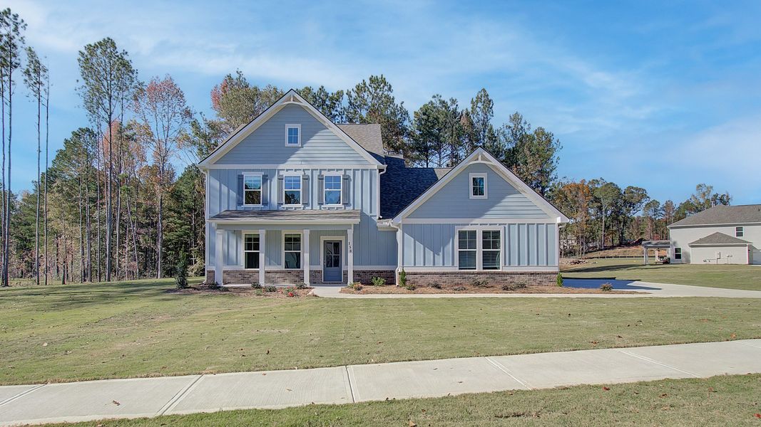 Representative exterior photo of a completed home built from the Brevard by DRB Homes in Saddleridge, Senoia, GA (Image 20). Representative exterior photo of a completed home built from the Brevard by DRB Homes in Saddleridge, Senoia, GA (Image 20).