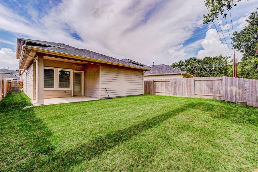 Enjoy the best of outdoor living in this fully fenced backyard featuring a generous covered patio. The perfect spot for weekend BBQs or morning coffee, this private oasis offers a lush, green lawn and ample space for gardening, play, or even a future pool, ideal for entertaining or relaxing in your own slice of Texas sunshine. Enjoy the best of outdoor living in this fully fenced backyard featuring a generous covered patio. The perfect spot for weekend BBQs or morning coffee, this private oasis offers a lush, green lawn and ample space for gardening, play, or even a future pool, ideal for entertaining or relaxing in your own slice of Texas sunshine.