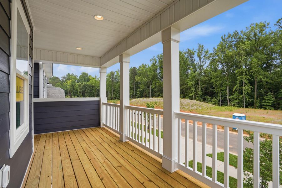 Exterior details and patio area of a home in Enclave at Riverdale, Huntersville (Image 18).