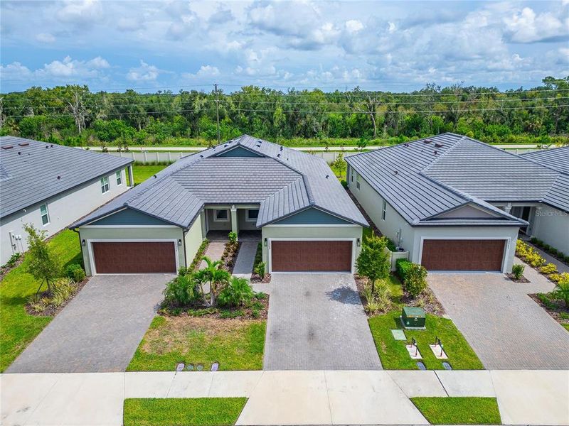Front exterior of a new home in , Parrish, FL, highlighting curb appeal (Image 29).