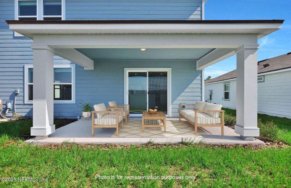 Front exterior of a new home in Wells Landing, Jacksonville, FL, highlighting curb appeal (Image 1).