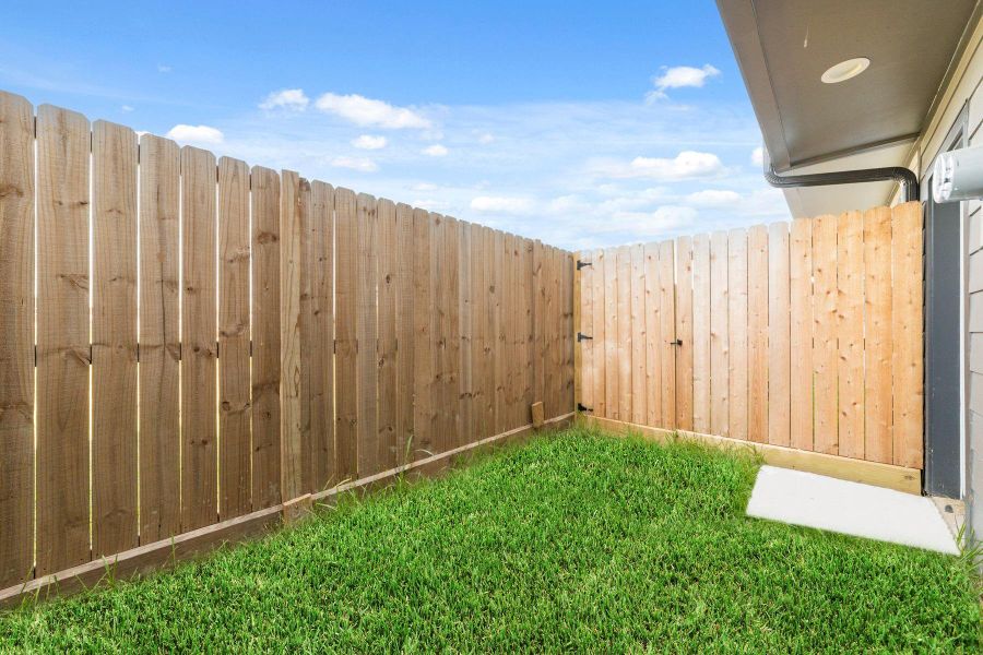 Exterior details and patio area of a home in , Houston (Image 3). Exterior details and patio area of a home in , Houston (Image 3).