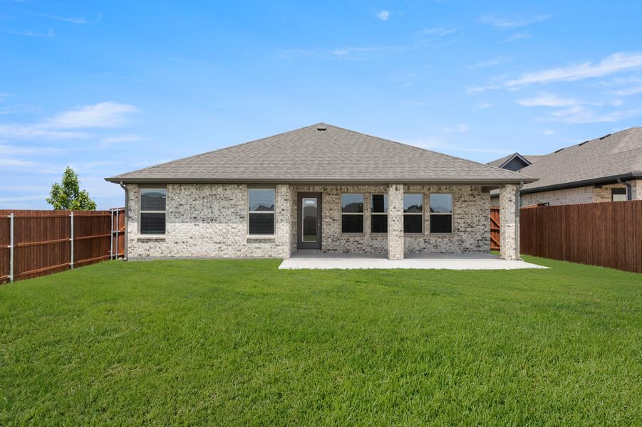 Front exterior of a new home in Northspur, Terrell, TX, highlighting curb appeal (Image 26). Front exterior of a new home in Northspur, Terrell, TX, highlighting curb appeal (Image 26).