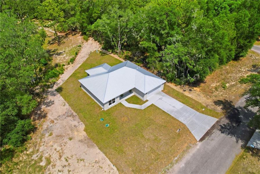 Exterior details and patio area of a home in , Ocklawaha (Image 17).