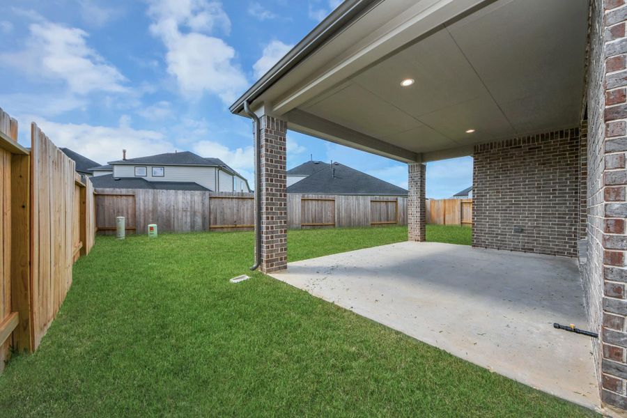 Explore the expansive backyard with its inviting covered patio—a perfect blend of space for the kids to play and adults to unwind. Ideal for creating your outdoor oasis, this backyard accommodates patio furniture, a BBQ pit, and endless possibilities for leisure and entertainment.
