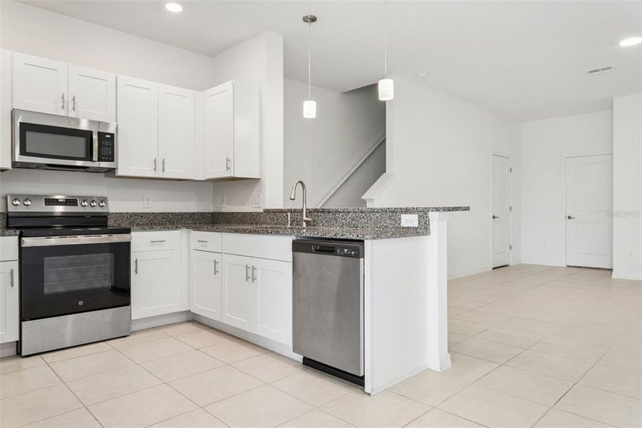 Furnished interior view inside a new home in Angeline, Land O' Lakes (Image 7).