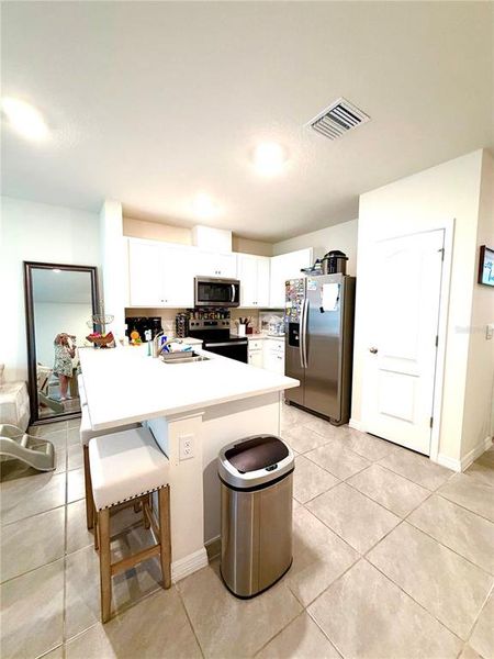 Furnished interior view inside a new home in , Davenport (Image 15).