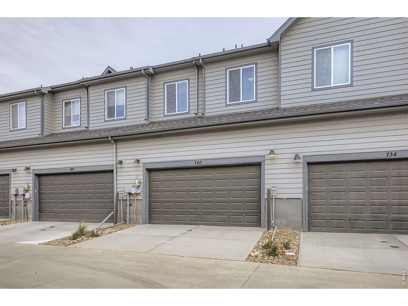 Front exterior of a new home in , Fort Collins, CO, highlighting curb appeal (Image 26).