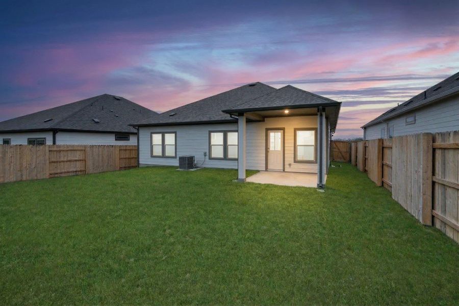 Rear of Home and Private Backyard