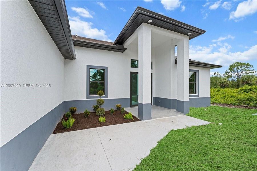 Exterior details and patio area of a home in , Lehigh Acres (Image 29).