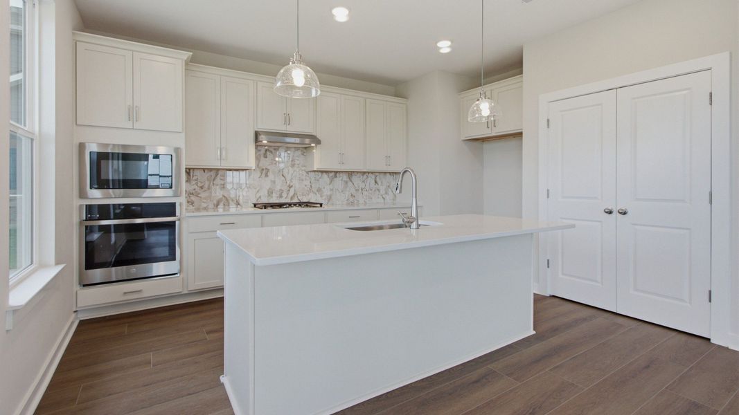 Kitchen essentials and elevated double-door pantry Kitchen essentials and elevated double-door pantry