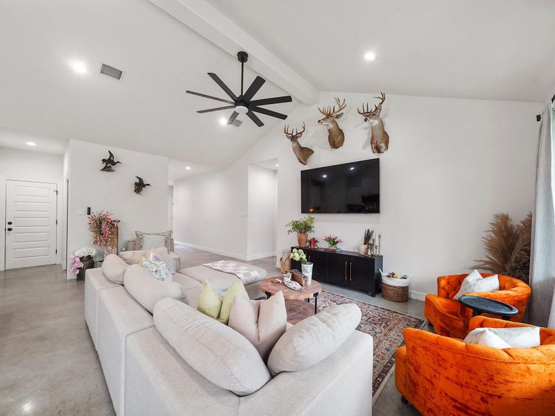 NOTICE THE AWESOME VAULTED CEILING AND LARGE CEILING FAN