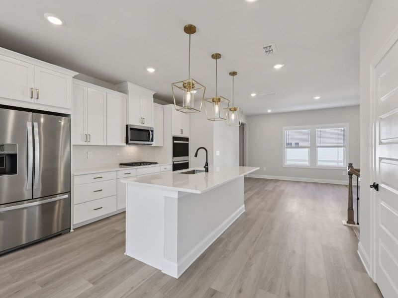 Furnished interior view inside a new home in Hemingway - Highland Series, Cumming (Image 6).