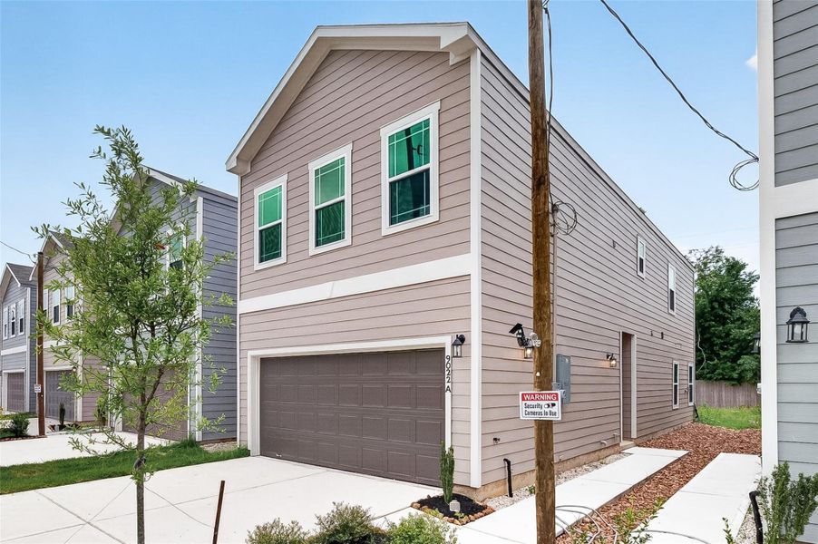 Front exterior of a new home in , Houston, TX, highlighting curb appeal (Image 1). Front exterior of a new home in , Houston, TX, highlighting curb appeal (Image 1).