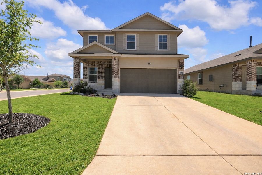 Front exterior of a new home in Langdon, San Antonio, TX, highlighting curb appeal (Image 24).