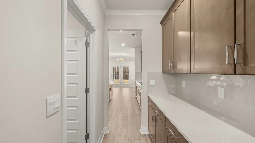 Representative furnished interior of a home built from the Hampshire by D.R. Horton in Heritage Pointe, Senoia (Image 11).