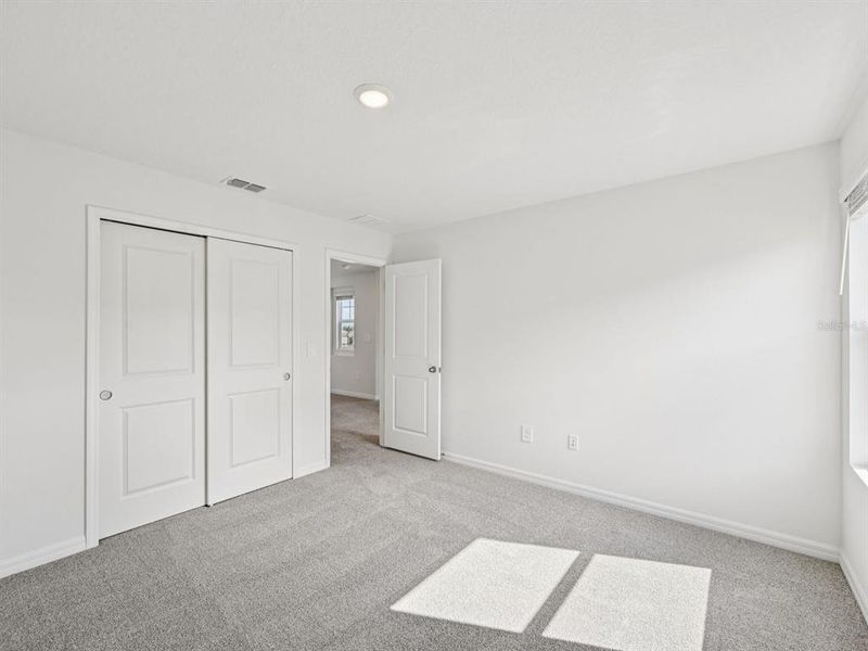 Spacious, unfurnished interior of a new home in Oakfield Trails - Signature Series, Parrish (Image 16).