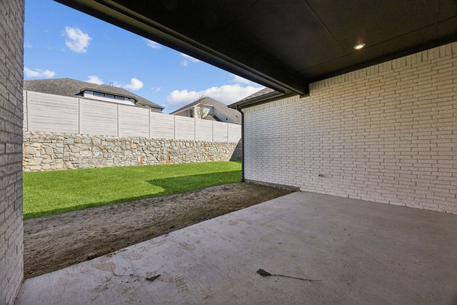 Exterior details and patio area of a home in Painted Tree Lakeside, McKinney (Image 3).