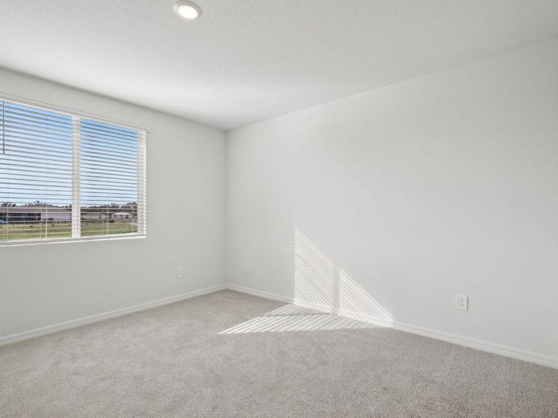 Spacious, unfurnished interior of a new home in The Grove at Stuart Crossing - Premier Series, Bartow (Image 10). Spacious, unfurnished interior of a new home in The Grove at Stuart Crossing - Premier Series, Bartow (Image 10).