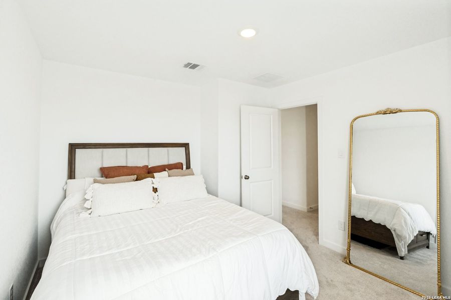 Furnished interior view inside a new home in Hidden Trails, Bulverde (Image 9).