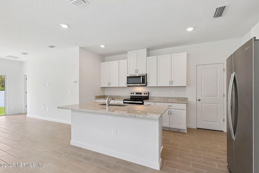 Furnished interior view inside a new home in Cypress Meadows - Classic Series, Jacksonville (Image 6).