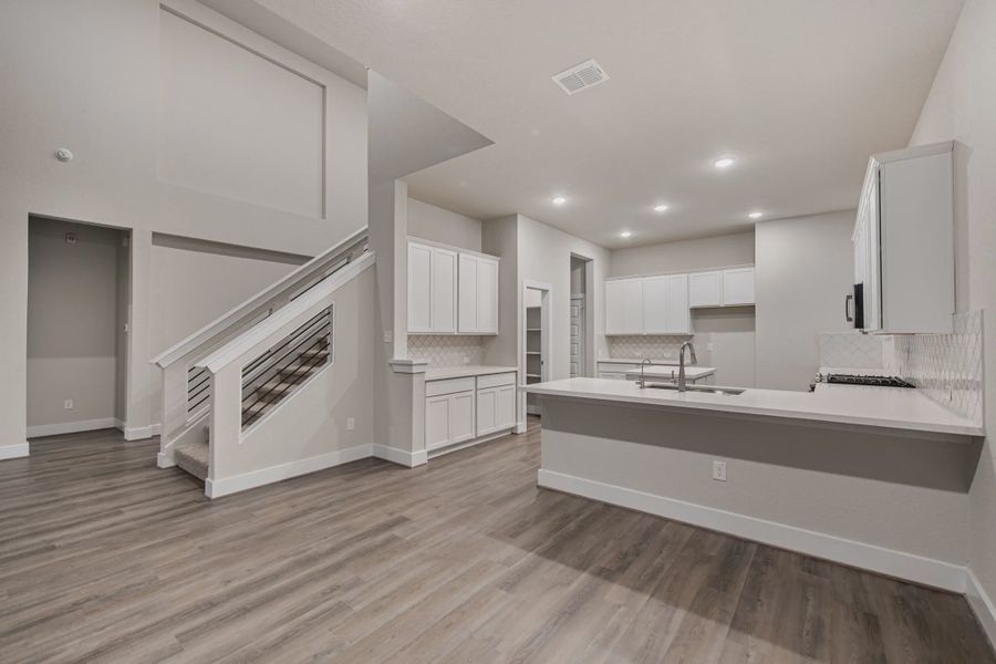 Representative furnished interior of a home built from the Brandy by Chesmar Homes in Buffalo Crossing, Cibolo (Image 25).