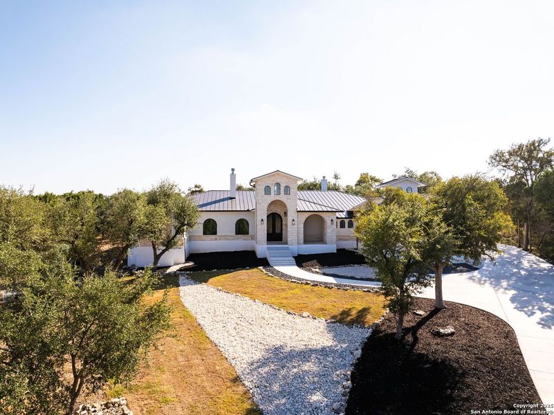 Front exterior of a new home in , New Braunfels, TX, highlighting curb appeal (Image 1).