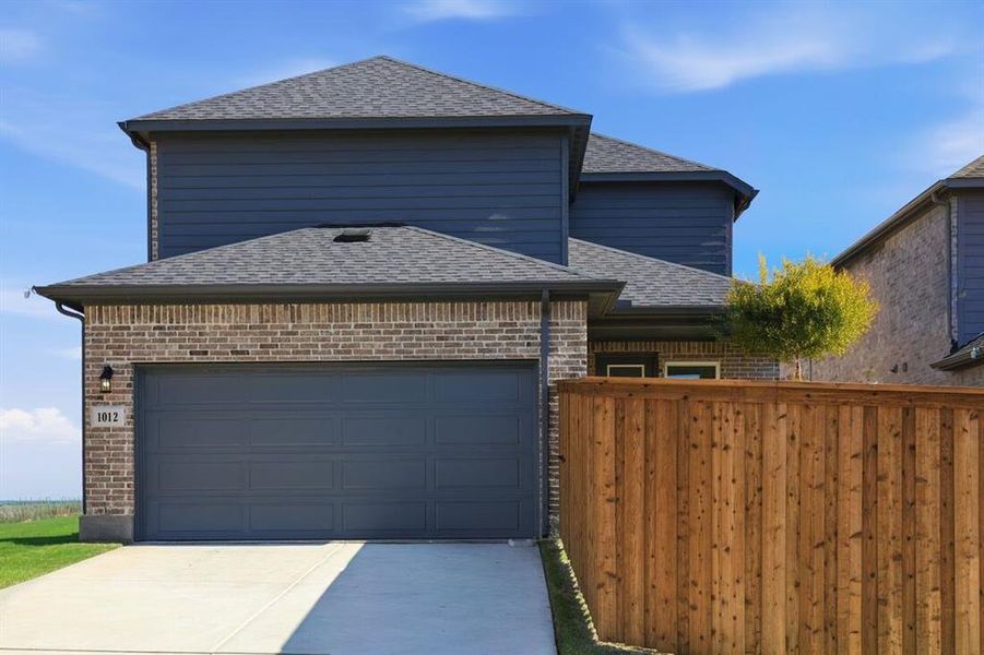 Front exterior of a new home in The Ranch at Uptown Celina 40s, Celina, TX, highlighting curb appeal (Image 2). Front exterior of a new home in The Ranch at Uptown Celina 40s, Celina, TX, highlighting curb appeal (Image 2).