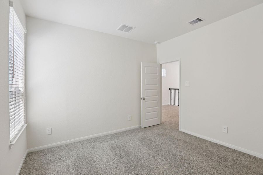 Spacious, unfurnished interior of a new home in Kemah Crossing - Luxe Series, Kemah (Image 38). Spacious, unfurnished interior of a new home in Kemah Crossing - Luxe Series, Kemah (Image 38).