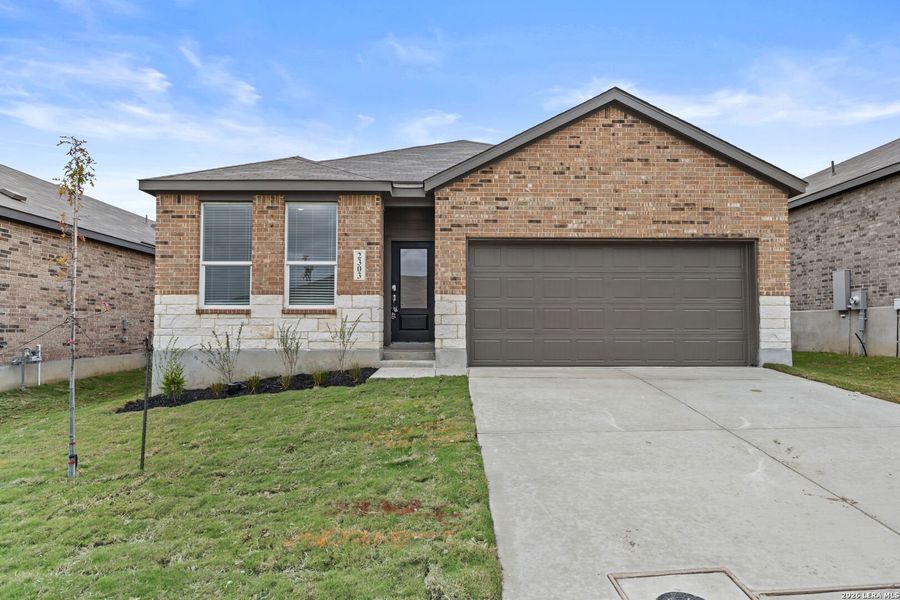 Front exterior of a new home in Grace Valley, Marion, TX, highlighting curb appeal (Image 1). Front exterior of a new home in Grace Valley, Marion, TX, highlighting curb appeal (Image 1).