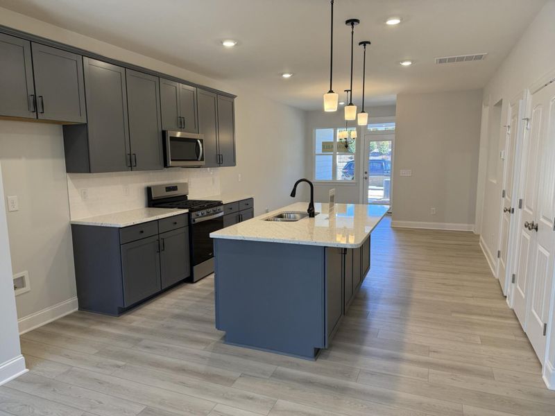 Furnished interior view inside a new home in Enclave at Traditions Townhomes, Wake Forest (Image 5). Furnished interior view inside a new home in Enclave at Traditions Townhomes, Wake Forest (Image 5).