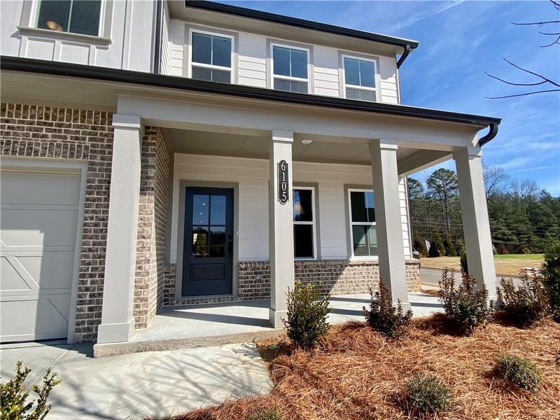 Exterior details and patio area of a home in Arbors at Richland Creek, Buford (Image 4).